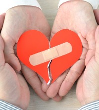 A mended heart with a band-aid, representing a positive outcome in Marriage Counseling in Peoria IL