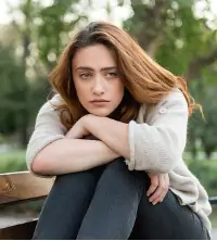A sad woman struggling with Summer Depression